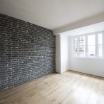 Chambre mur de briques